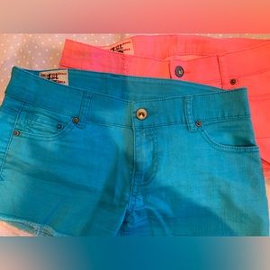 Two colored jeans shorts, size 6